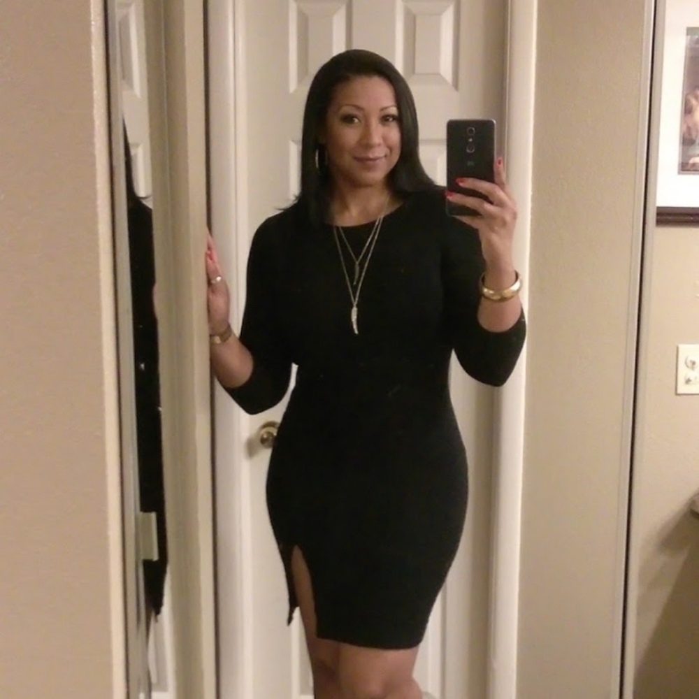 Black dress with front split.